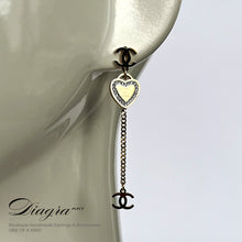 Load image into Gallery viewer, Chanel earrings Dangle gold tone hearth cc 
