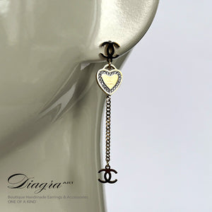 Chanel earrings Dangle gold tone hearth cc 