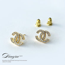 Load image into Gallery viewer, Chanel Earrings gold tone encrusted with swarovski Diagra Art 230203