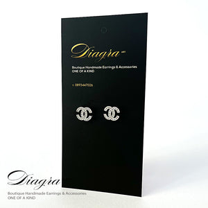 CC Earrings silver tone encrusted with swarovski Diagra Art 230203