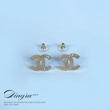 Load image into Gallery viewer, CC earrings encrusted with Swarovski Diagra Art 2402241