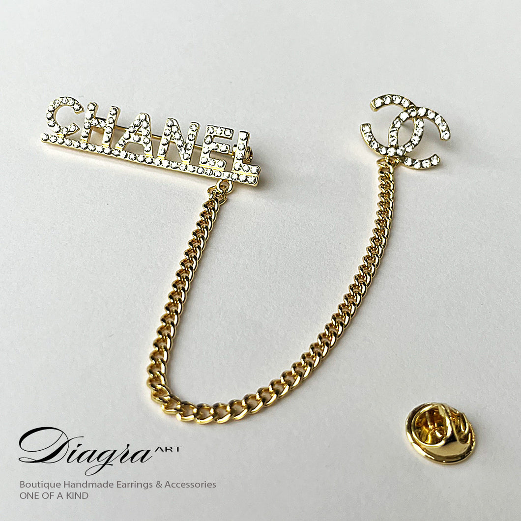 Chanel gold tone chain brooch 25673