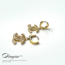 Load image into Gallery viewer, Dangle gold tone cc earrings handmade 240123