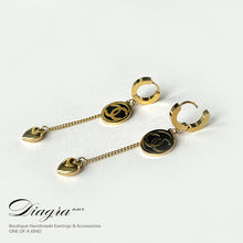 Load image into Gallery viewer, Dangle gold tone cc earrings black opal handmade 0303236