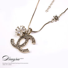 Load image into Gallery viewer, chanel-necklace-designer-inspired-bronze-logo-flower-61959-1