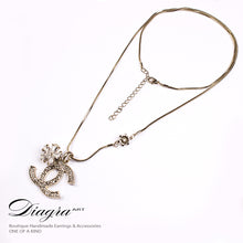 Load image into Gallery viewer, chanel-necklace-designer-inspired-bronze-logo-flower-61959-all