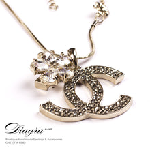 Load image into Gallery viewer, chanel-necklace-designer-inspired-bronze-logo-flower-61959-side
