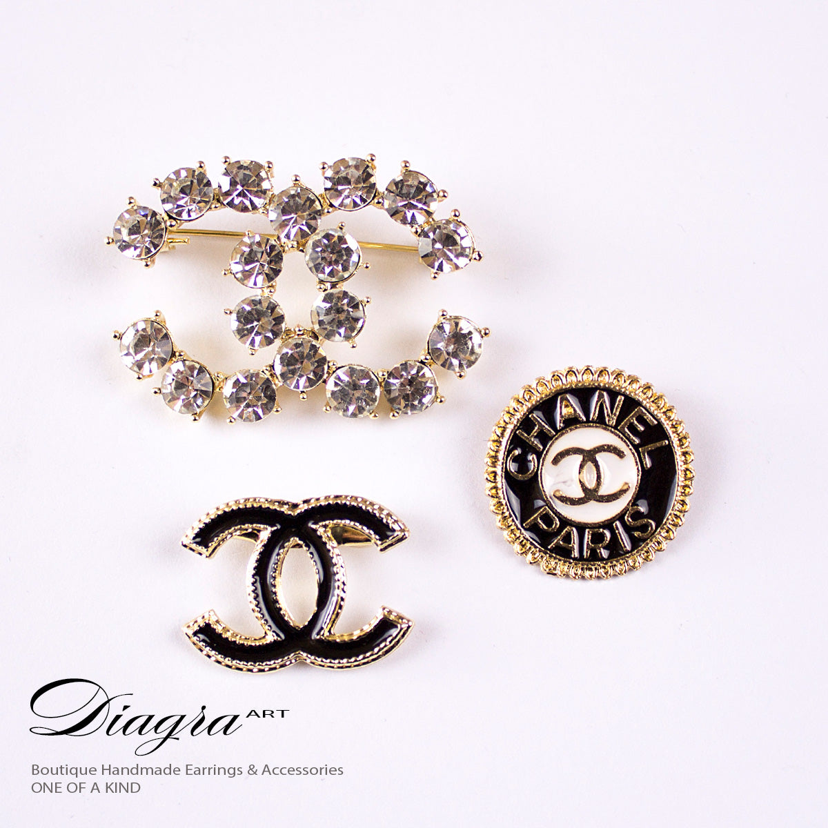 Set of 3 chanel brooches CC black goldtone and crystal diagra art 200240 –  Diagra